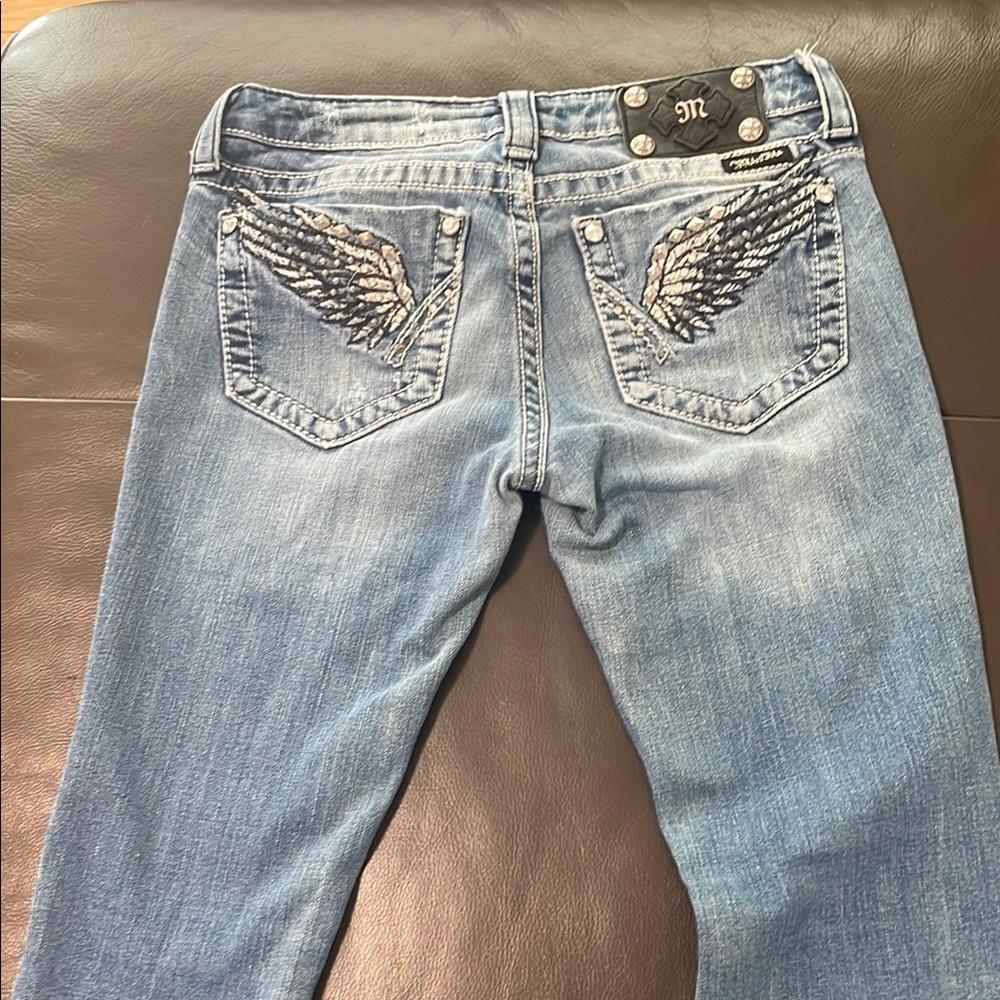 Miss Me Blue Jeans with Decorative Stitching and Faded Finish